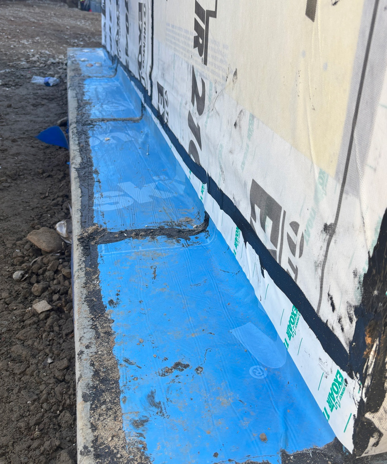 ExoAir air barrier to below grade connection.