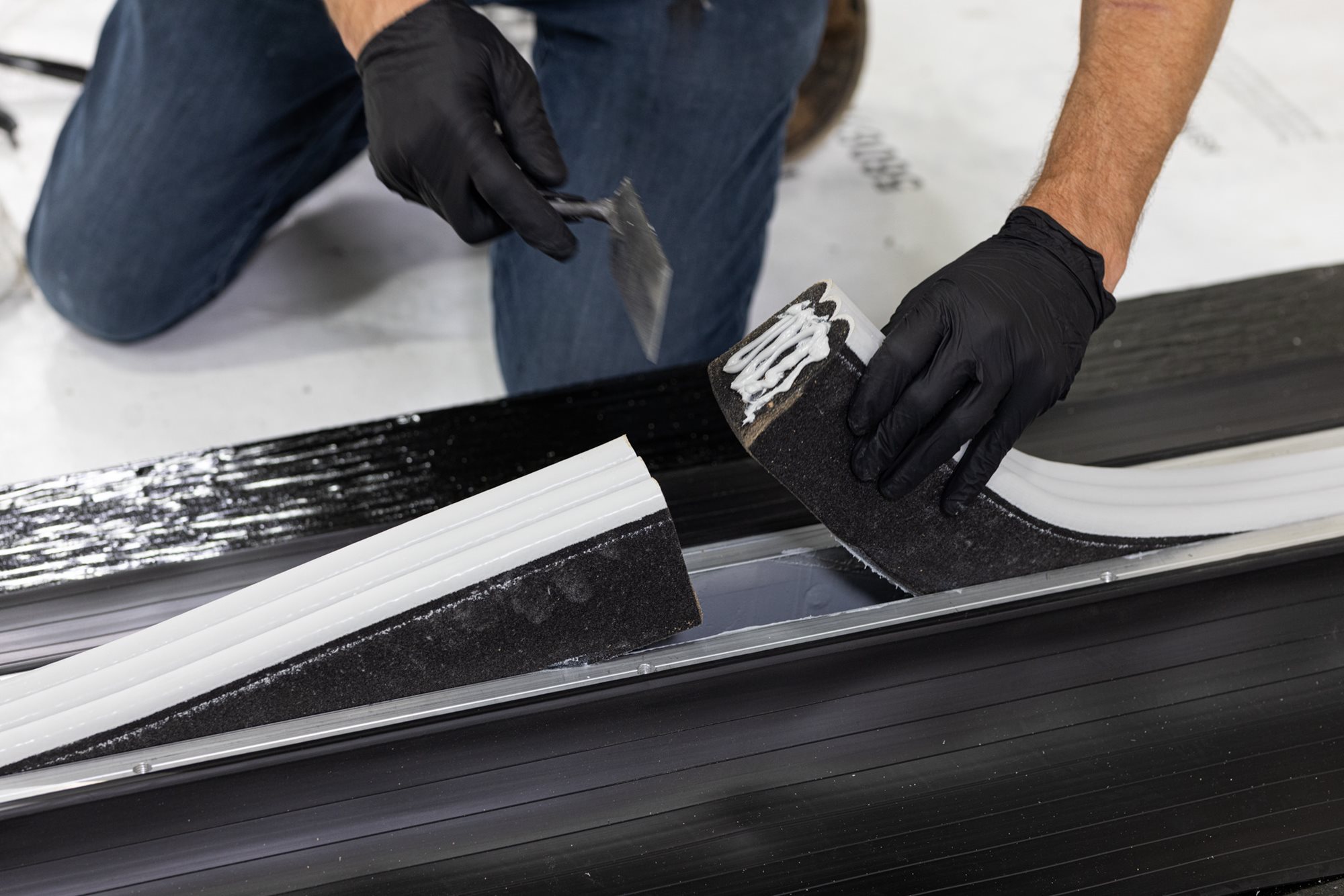 Compressed foam sealant application.